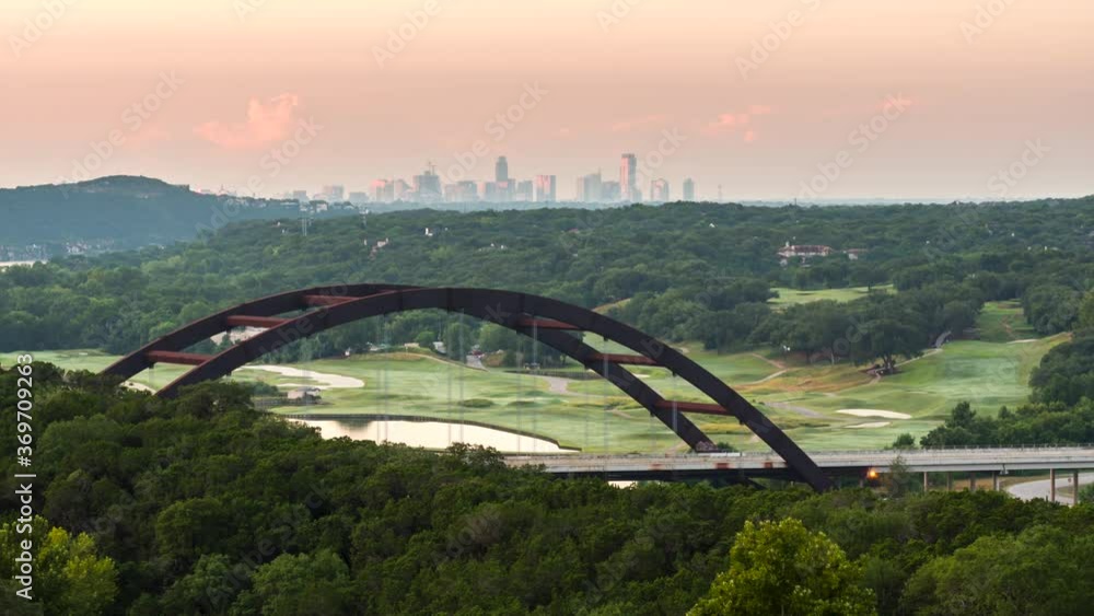 Time Lapse of Iconic Bridge in Austin Texas with Lake and Skyline in the background Time Lapse of Iconic Bridge in Austin Texas with Lake and Skyline in the background