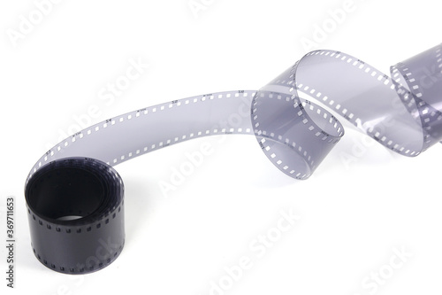 35mm film strip in white background, copy space cinema word with place for text, film strip for festival, brochure, poster, banner or flyer. Film entertainment concept.