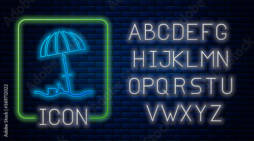 Glowing neon Sun protective umbrella for beach icon isolated on brick wall background. Large parasol for outdoor space. Beach umbrella. Neon light alphabet. Vector Illustration.