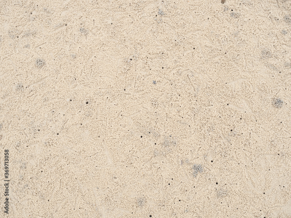 Fill frame of arts pattern developed of small ghost crab hole on sand beach. Fill frame of arts pattern developed of small ghost crab hole on sand beach.