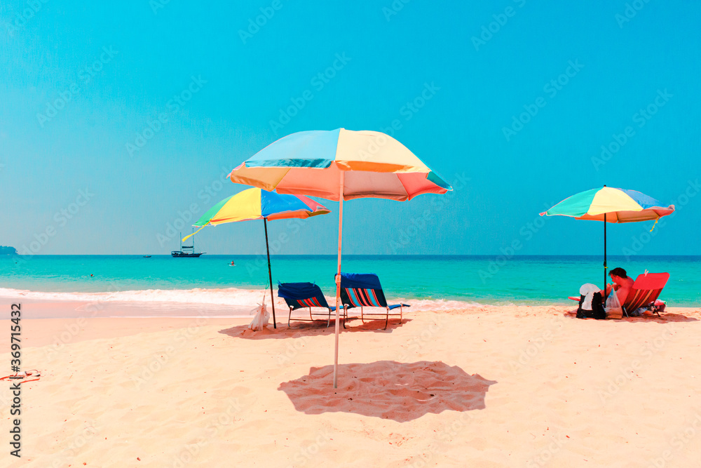 Umbrellas on the sandy beach in summer
