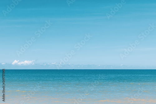 Fototapeta Naklejka Na Ścianę i Meble -  Minimalist the boat in the sea with clear sky.Blue Background.
