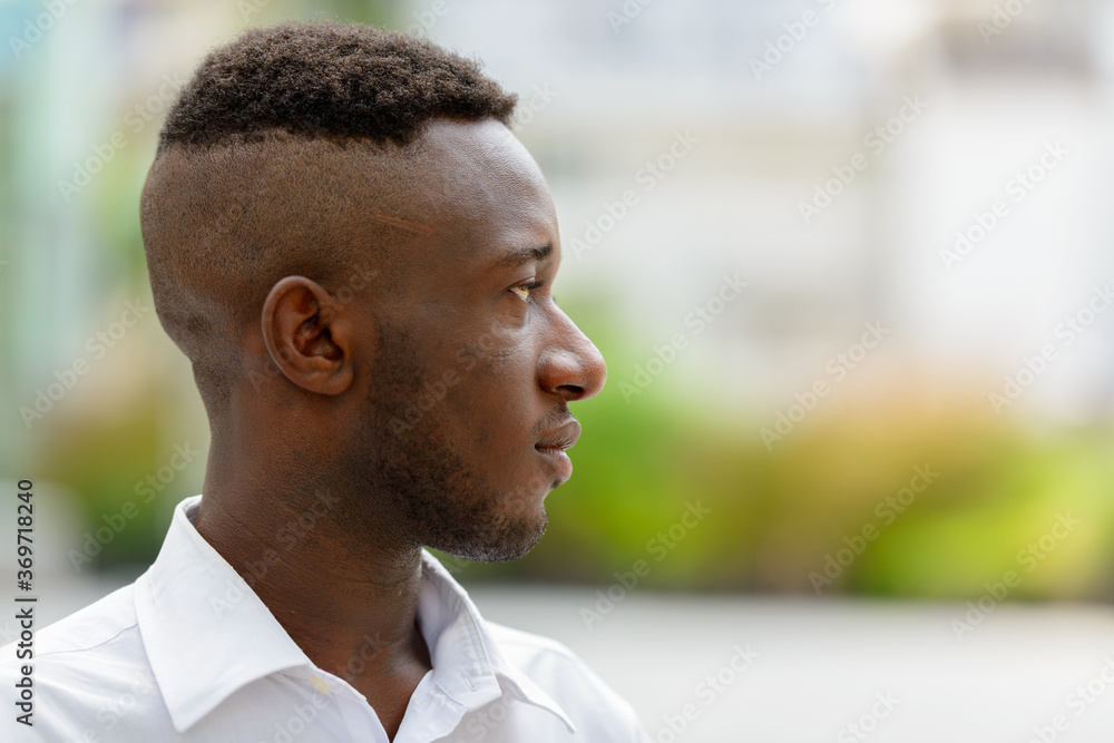 Young African businessman in the city outdoors Young African businessman in the city outdoors