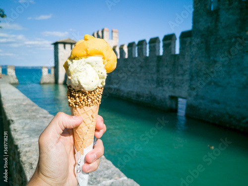 Wallpaper Mural Big icecrem with lake view in Sirmione, Italy Torontodigital.ca