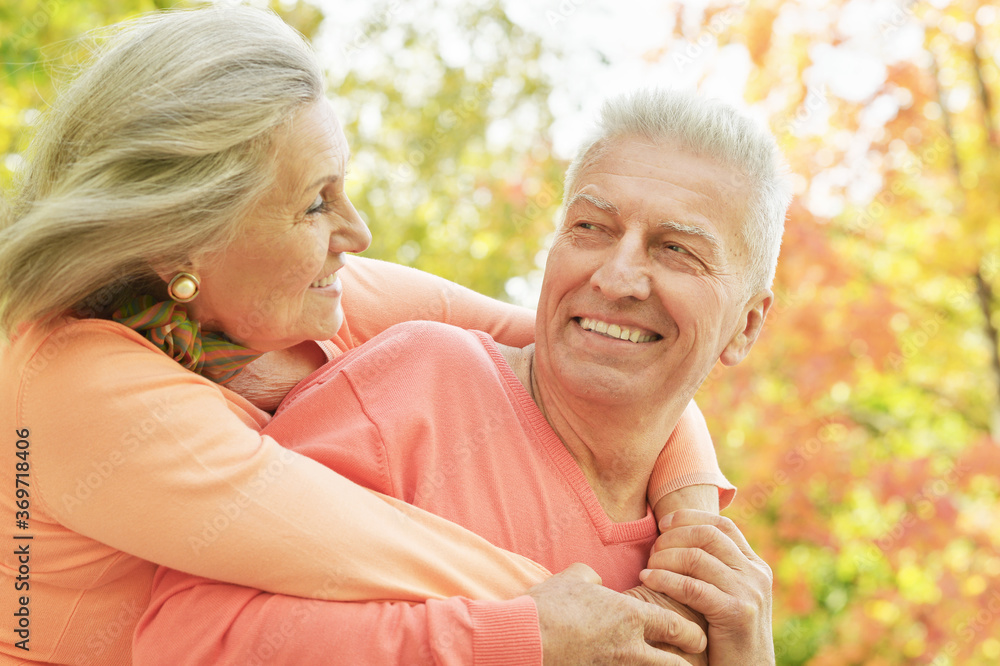 Close-up portrait of caucasian senior couple in the park Close-up portrait of caucasian senior couple in the park