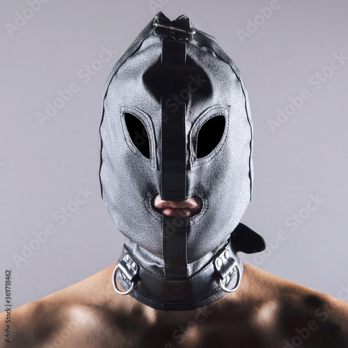 Man wearing a leather hood #D8995