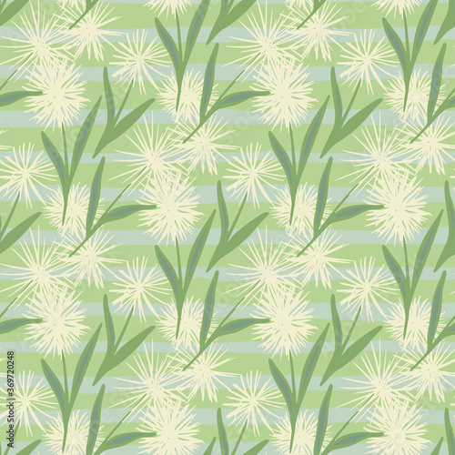 Spring hand drawn seamless floral pattern with dandelions. Stripped background with botanic elements in light and green tones.