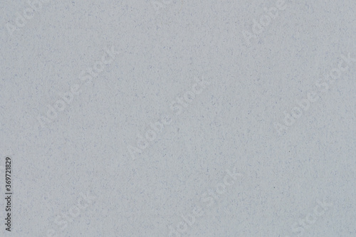 White paper sheet with blue granular