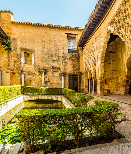 A peaceful inner courtyard in Seville, Spain in the summertime photo