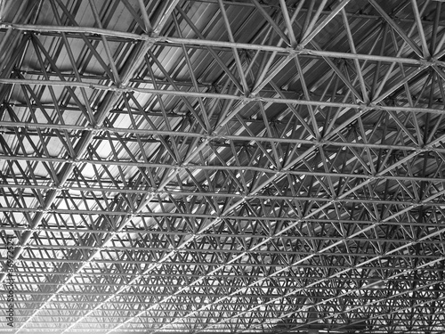 Wallpaper Mural Metal truss frame roof of factory in black and white color with flare. Torontodigital.ca