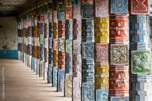 Colourful pillars of the ancient Hindu temple of Vaitheeswaran Koil in Tamil Nadu.