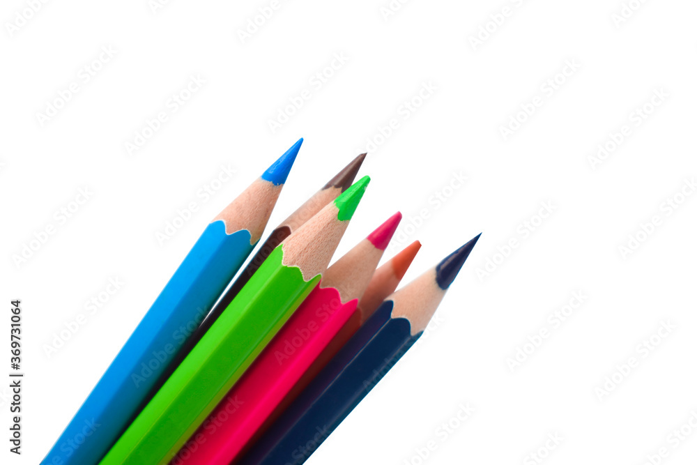 Six different colored wood pencil crayons gathered together on a white background Six different colored wood pencil crayons gathered together on a white background