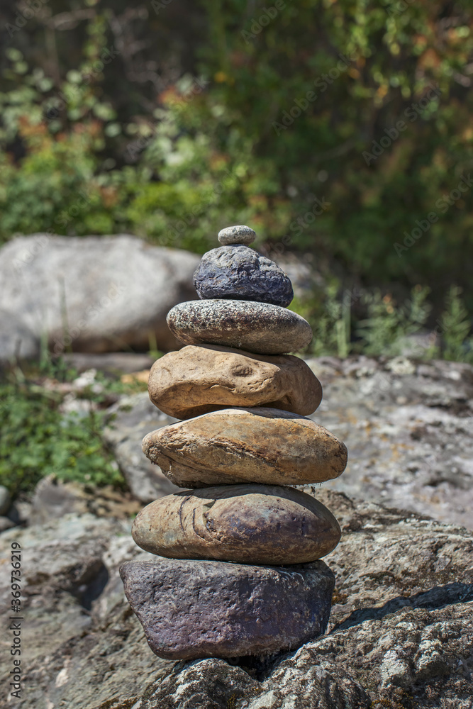 The tradition of making cairns and making a wish. Beautiful photos of the nature of Gorny Altai in the summer. The tradition of making cairns and making a wish. Beautiful photos of the nature of Gorny Altai in the summer.