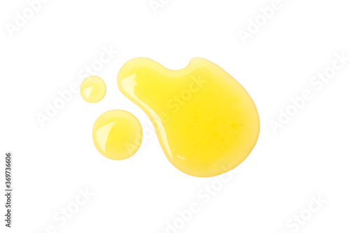 Honey spots isolated on white background, top view