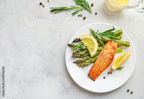 Delicious lunch, baked salmon with asparagus