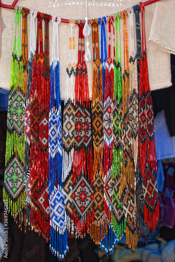Hanging textured bead necklaces of traditional Ukrainian style