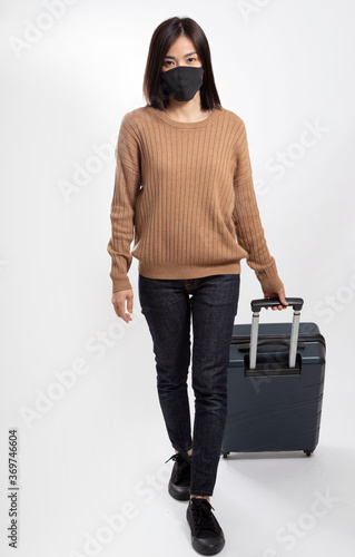 The Asian woman standing on the white background.