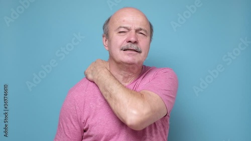 Senior man man in pain with neck injury