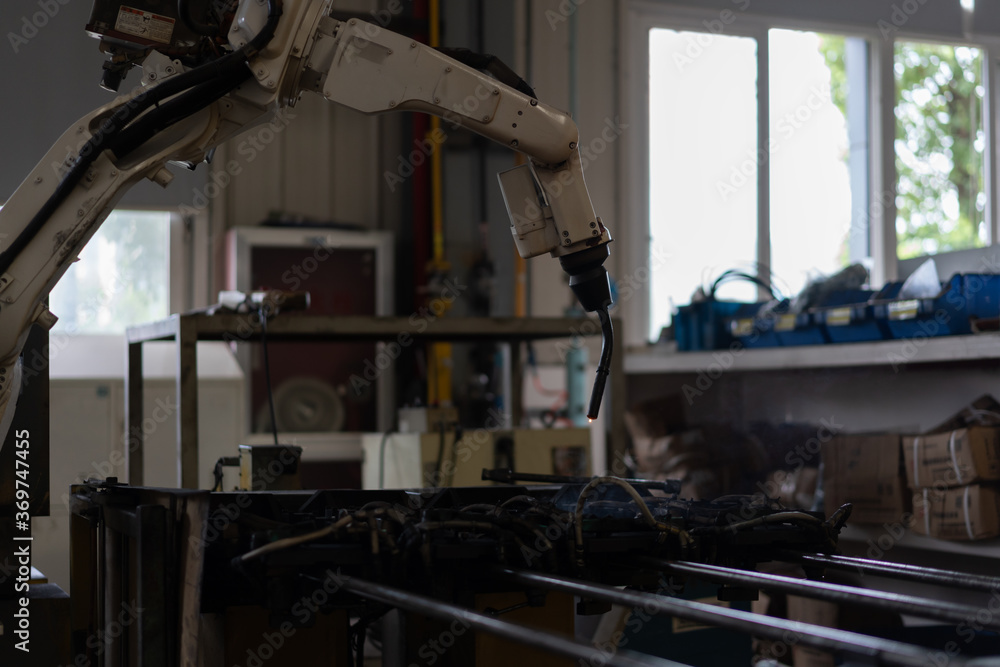 Fototapeta premium robot arm working in factory