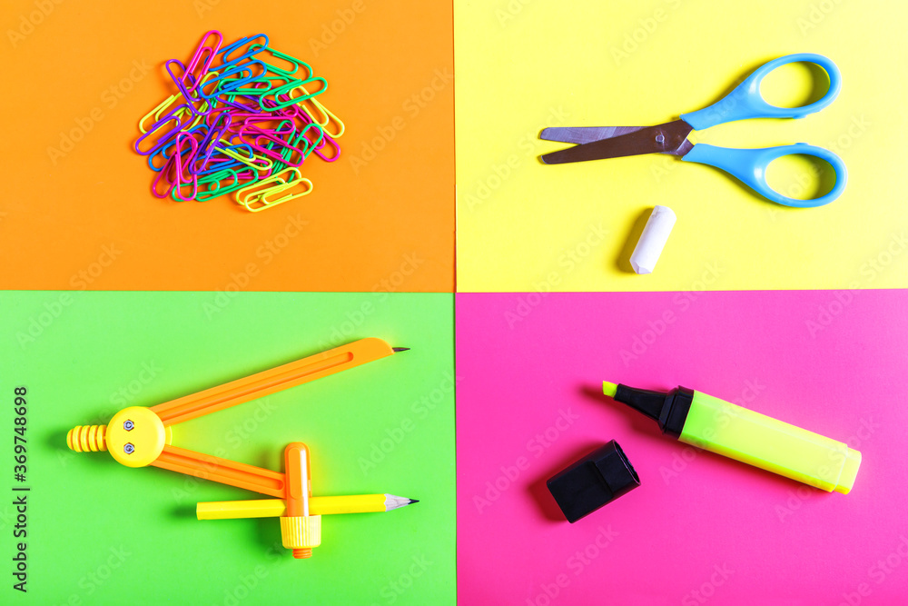 Various school supplies on a colorful background. Back to school concept. Learning and education concept. Stationery store concept. Bright creative school background. Top view, flat lay. Various school supplies on a colorful background. Back to school concept. Learning and education concept. Stationery store concept. Bright creative school background. Top view, flat lay.