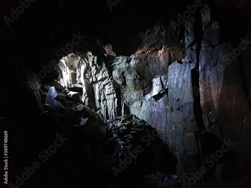 light going into cave in borrowdale, Lake District National Park. photo