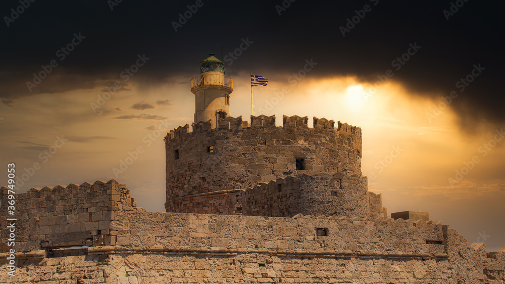 The famous lighthouse, the Agios Nikolaos on the island Rhodes, Greece