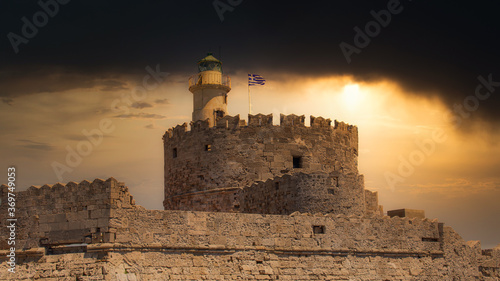 Obraz na płótnie The famous lighthouse, the Agios Nikolaos on the island Rhodes, Greece w salonie