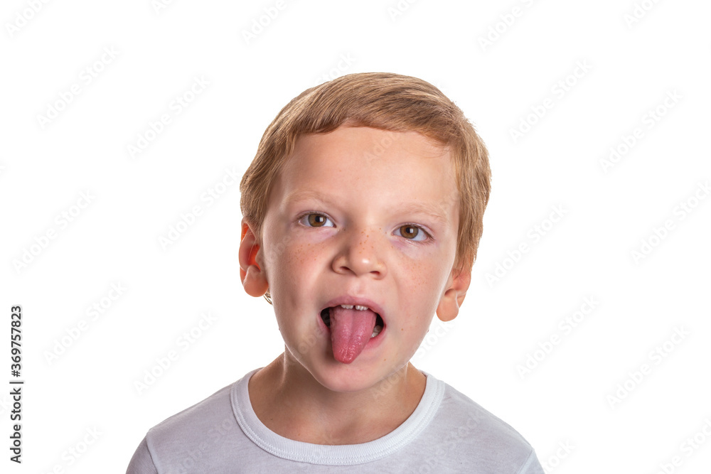 Speech therapy concept. Little boy doing exercises for correct pronunciation. Isolation on a white background. High quality photo Speech therapy concept. Little boy doing exercises for correct pronunciation. Isolation on a white background. High quality photo