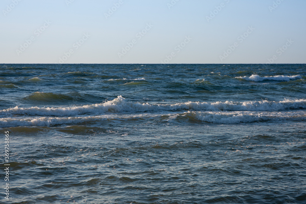 custom made wallpaper toronto digitallate evening at the Baltic Sea, the sun reflects on the waves