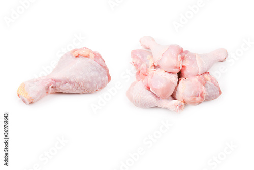 Tasty raw chicken legs. Top view. Isolated on white