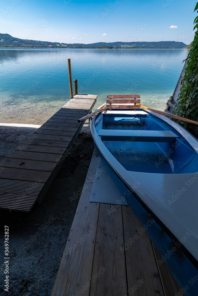 Naklejka premium Rowing Boat at the Kochelsee, Bavaria, Germany