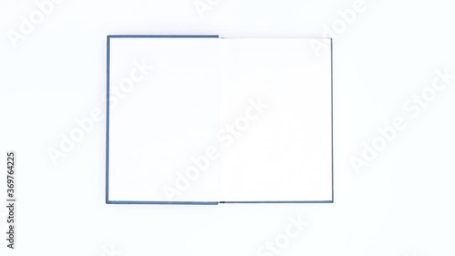 Wallpaper Mural Blue book appear and open. Stop motion  Torontodigital.ca