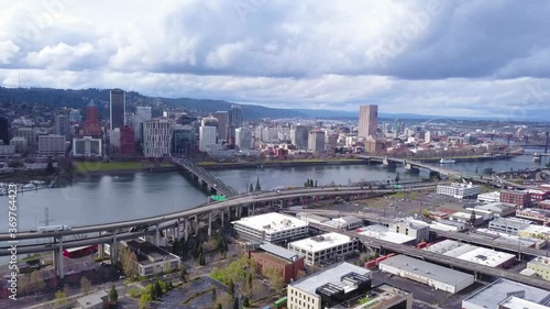 Wallpaper Mural Aerial flying backwards from downtown Portland Oregon cityscape skyline in Spring during the coronavirus Covid19 outbreak pandemic and mostly empty streets because people stay home in a safe place. Torontodigital.ca