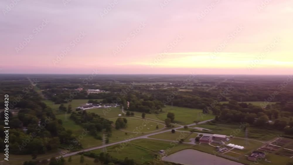 Panoramic View Of East China Township Of St. Clair County Near The St. Clair Power Plant In Michigan, USA On A Sunrise. - Aerial (panning right) Panoramic View Of East China Township Of St. Clair County Near The St. Clair Power Plant In Michigan, USA On A Sunrise. - Aerial (panning right)