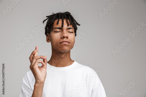 Worried african man wearing casual clothing