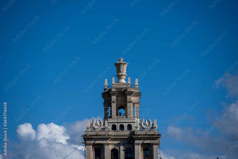 Fototapeta premium high-rise buildings reflections of sky and clouds and pre-storm sky in summer