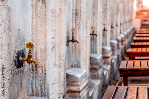 Photography Copper ornate ablution taps