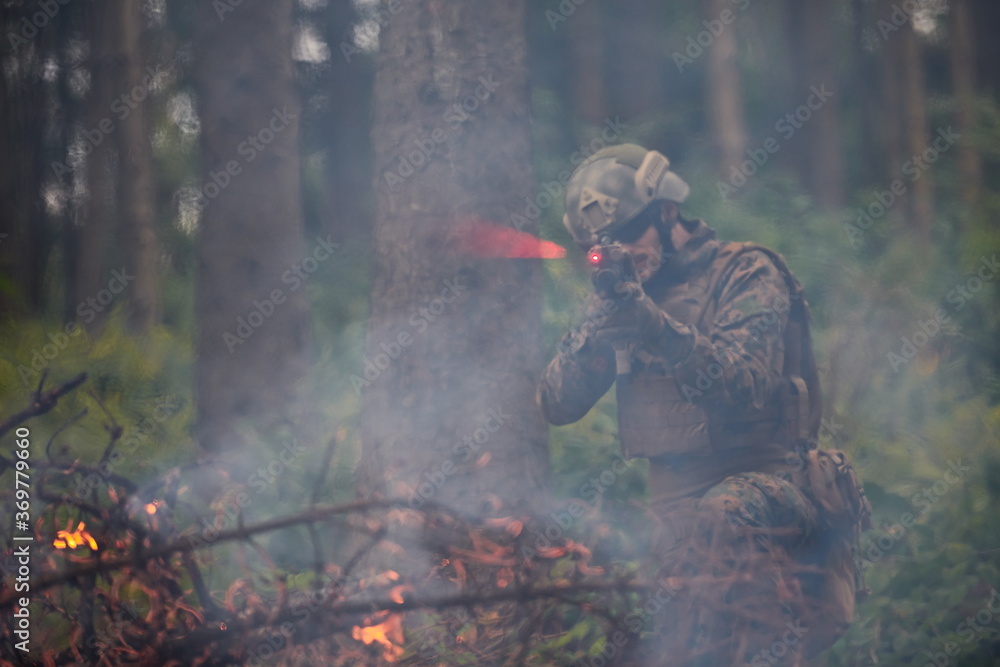 soldier in action aiming on weapon laser sight optics soldier in action aiming on weapon laser sight optics