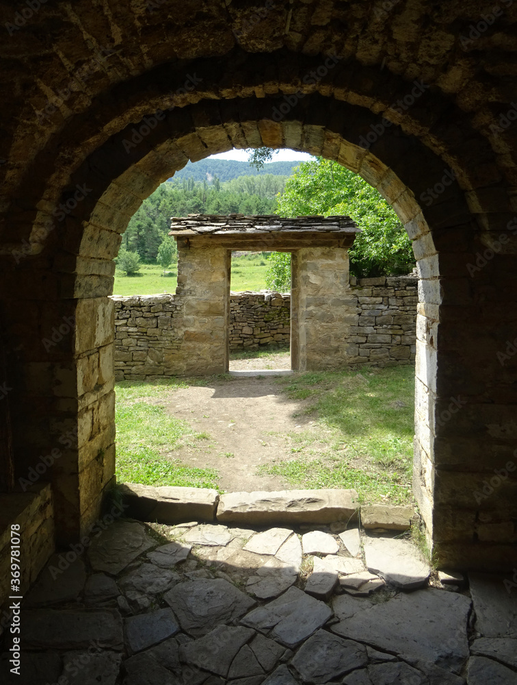 Obraz premium Main door of the Mozarab Romanesque Church of Santa Eulalia in the village of Susín. 11th century. Serrablo Region. Aragón. Spain. 