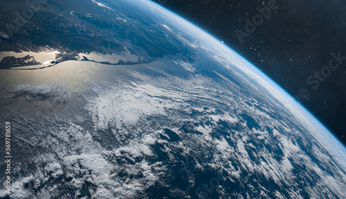 Fototapeta Naklejka Na Ścianę i Meble -  Planet Earth surface in space. Orbit of planet. Elements of this image furnished by NASA
