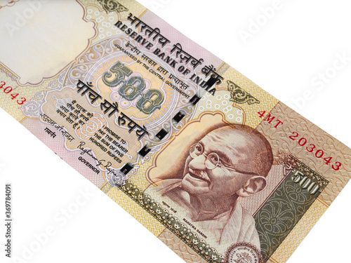 Indian currency 500 rupee cancelled banknote, India banned money closeup isolated on white background photo