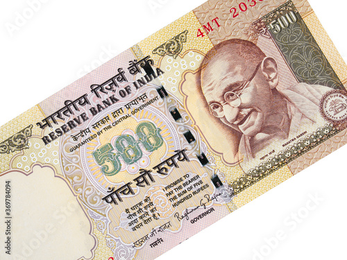 Indian currency 500 rupee cancelled banknote, India banned money closeup isolated on white background photo