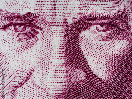 Kemal Ataturk eyes on Turkish one lira banknote close up macro, first President of Turkey, money closeup photo