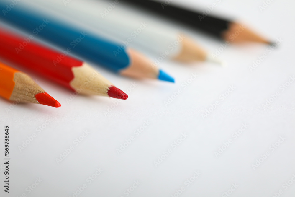 Colorful pencils and blank sheet of paper notebook Colorful pencils and blank sheet of paper notebook