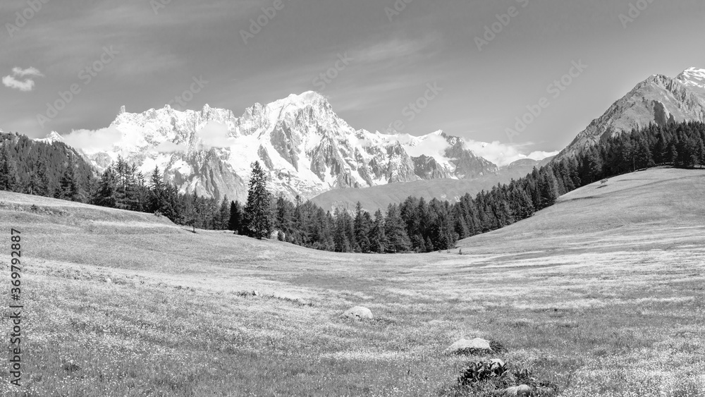 Obraz premium High mountain peaks in Italy, Aosta Valley, La Thuile. Monochrome
