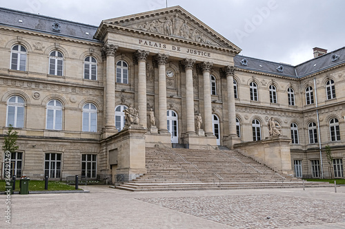 AMIENS, FRANCE - MAY 26, 2019: View of Palace of Justice of Amiens. Palace of Justice (Palais de Justice, 1868 - 1880) in city center of Amiens. Somme department, Picardie, France. 