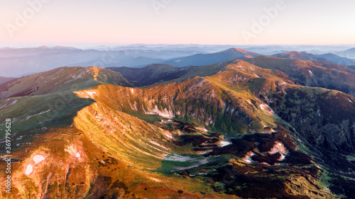 Panorama of Chornohirsky range in Ukrainian Carpathians on sunrise time. Hightest mountains in Ukraine in spring season. Landscape photography photo