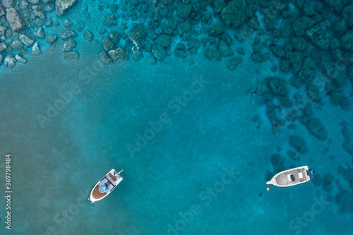 An aerial view of the beautiful Mediterranean Sea, where you can see   the cracked rocky textured underwater corals and the clean turquoise water of Protaras, Cyprus,  © Valentinos Loucaides