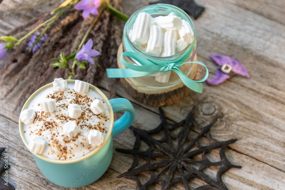 Morning coffee with foam and marshmallows. In celebration of Halloween. Morning coffee with foam and marshmallows. In celebration of Halloween.