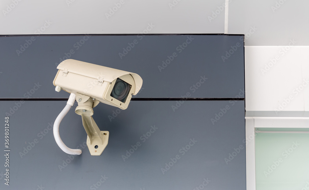 Security CCTV camera surveillance system outdoor of house.